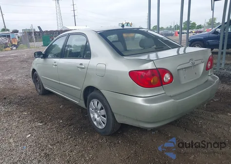 2003 Toyota Corolla Le z USA, uszkodzony, nr VIN JTDBR32EX30047579